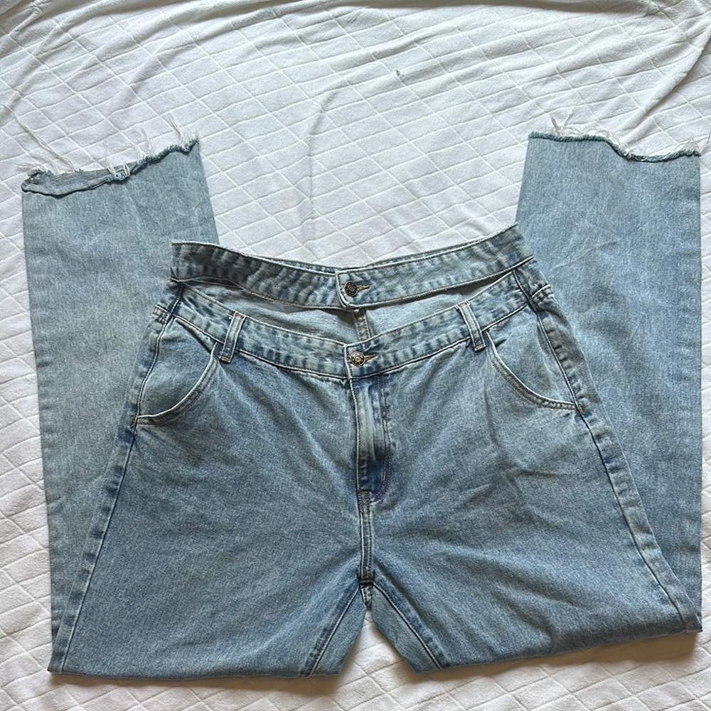 Light Blue asymmetric frayed jeans